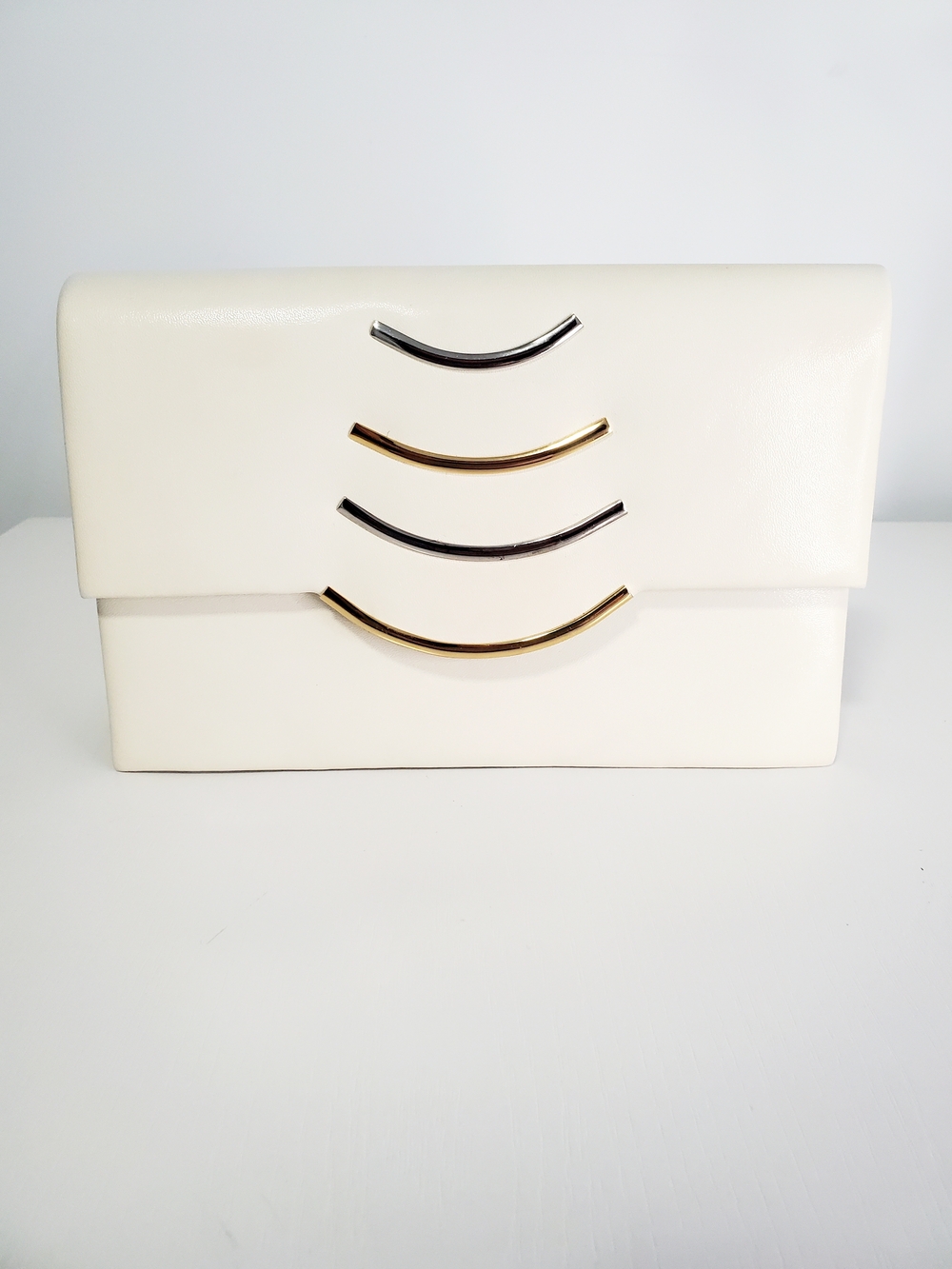 Elegant Cream Leather Clutch with Mixed Metal Accents